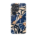 Blue Note Samsung Galaxy phone case featuring oversized navy blue abstract flowers, flowing botanical shapes, and warm caramel accents against a creamy ivory background.