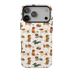 Sweater Weather MagSafe iPhone case featuring cute dachshunds wearing colorful teal, mustard, and rust knit sweaters with scattered autumn leaves on an ivory background.