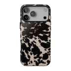 Spotted Cutie phone case featuring a bold black and cream cow print pattern with a trendy western-inspired aesthetic.