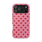 Phone case with red heart pattern on pink background