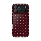 Phone case with polka dot pattern on a white background