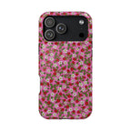 Phone case with strawberry and flower pattern on a pink background