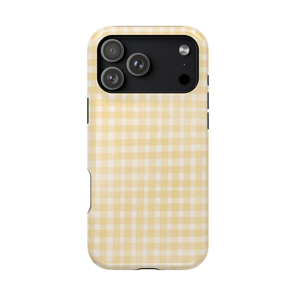 Phone case with yellow and white checkered pattern on a white background
