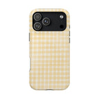 Phone case with yellow and white checkered pattern on a white background